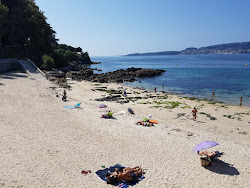 Praia de Portocelo'in fotoğrafı uçurumlarla desteklenmiş