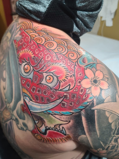 Explore back thigh tattoo ideas, creative tattoo ideas in Charleston, available at Broken Lantern Tattoo