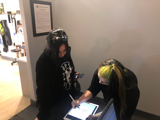 Explore minimalist dog tattoo ideas, creative tattoo ideas in Fort Wayne, available at Grade A Tattoos and Body Piercing