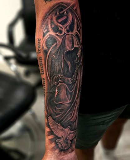 Explore cross tattoo cover up ideas, creative tattoo ideas in Bakersfield, available at Skin Kings Tattoo