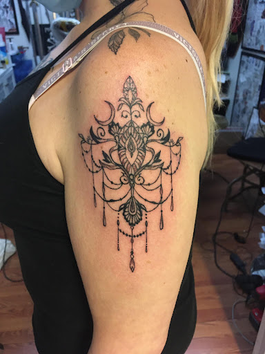 Explore covering up name tattoos ideas, creative tattoo ideas in Jonesboro, available at Immortal Ink