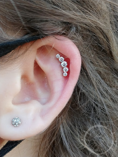 Explore road tattoo ideas, creative tattoo ideas in Eau Claire, available at Steel N Ink Body Piercing