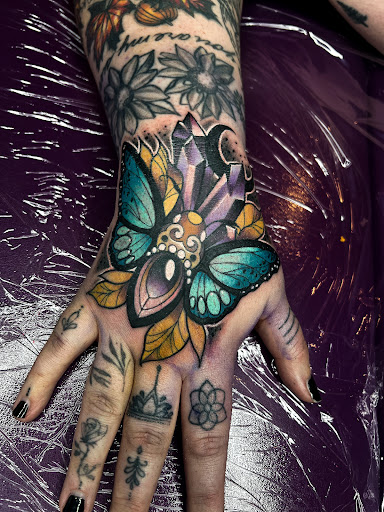 Explore forearm tattoo ideas for females, creative tattoo ideas in Fairmont, available at Heretic Ink