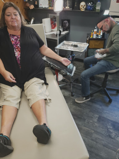 Explore half chest tattoos for men ideas, creative tattoo ideas in Des Moines, available at Skin Kitchen Tattoo