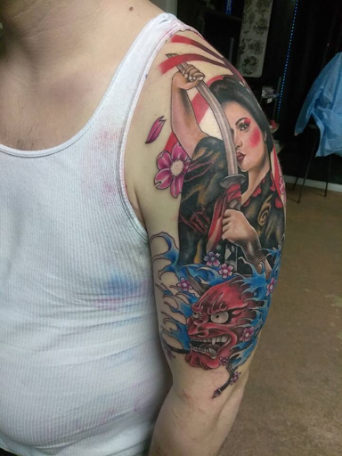 Explore small dog tattoo ideas, creative tattoo ideas in Springfield, available at Red Tip Tattoos