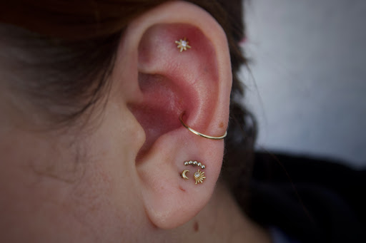 Explore tattoo ideas for top of leg, creative tattoo ideas in Corona Del Mar, available at Rainbow Piercing & Jewelry