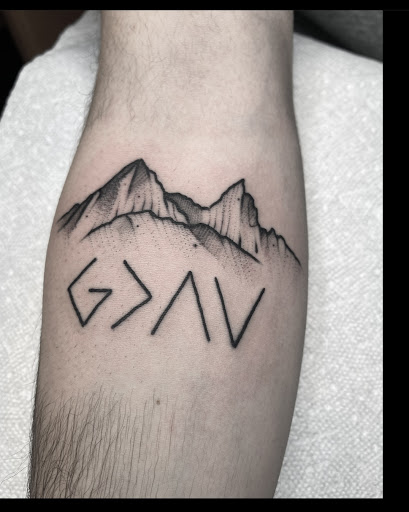 Explore little brother tattoo ideas, creative tattoo ideas in Johnson City, available at Gold Cross Tattoo Co.