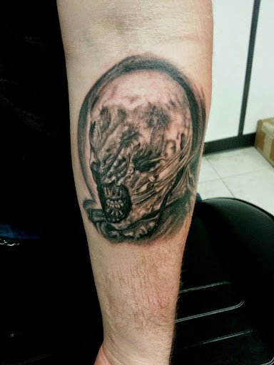 Explore compass tattoo cover up ideas, creative tattoo ideas in Sarasota, available at Z-Edge Tattoo and Body Piercing North Shop