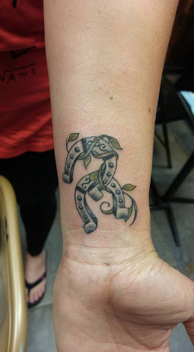 Explore 90s cartoon tattoo ideas, creative tattoo ideas in Redding, available at The Salty Sloth Tattoo