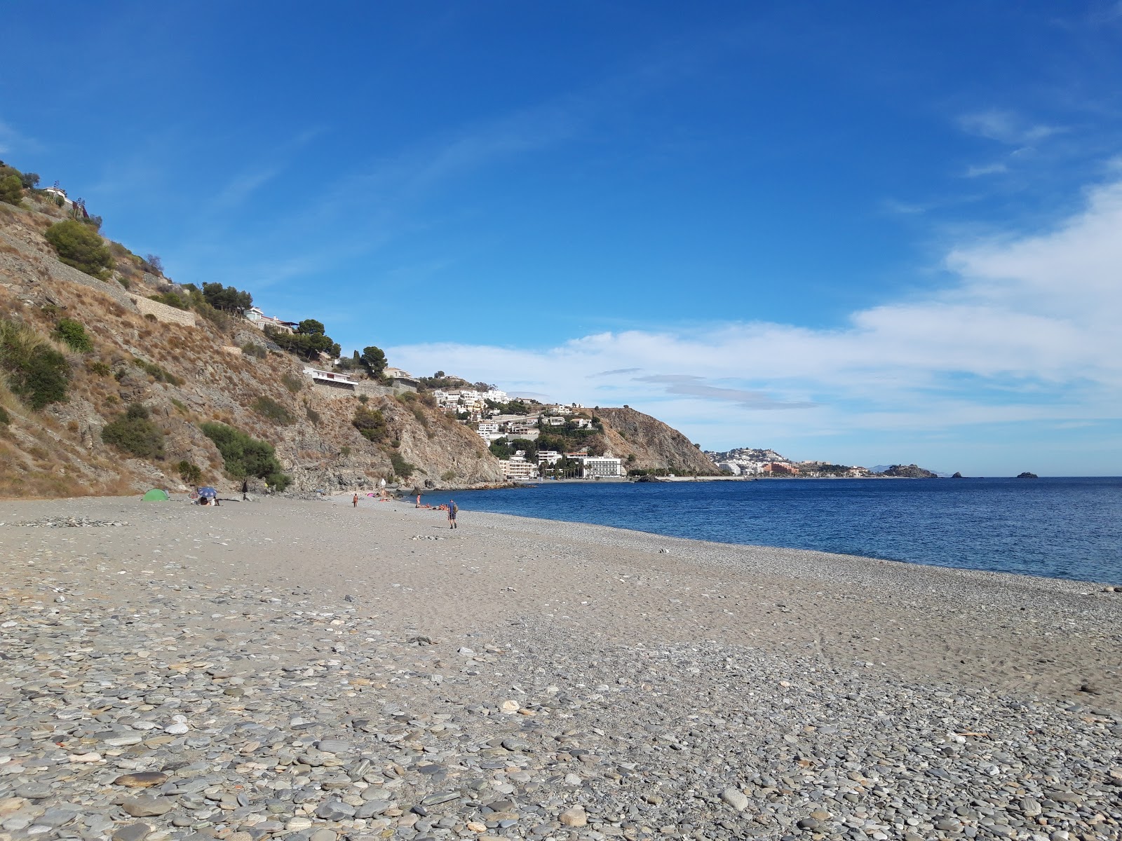 Foto von Playa el Muerto mit reines blaues Oberfläche