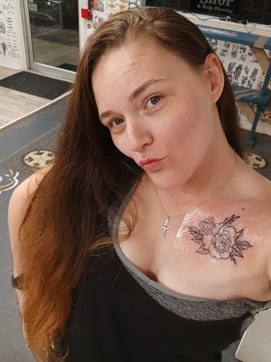 Explore lower back cover up tattoo ideas, creative tattoo ideas in Vidor, available at Tomans Tattoo Shop