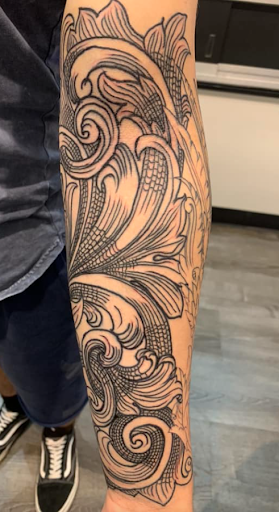 Explore tattoo ideas for covering up name, creative tattoo ideas in Columbus, available at Infamous Ink Tattoos and Piercings