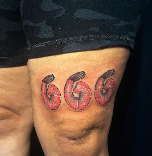 Find cardinal tattoo ideas for ladies for your next unique tattoo in Saint Paul at Black Coffin Tattoo