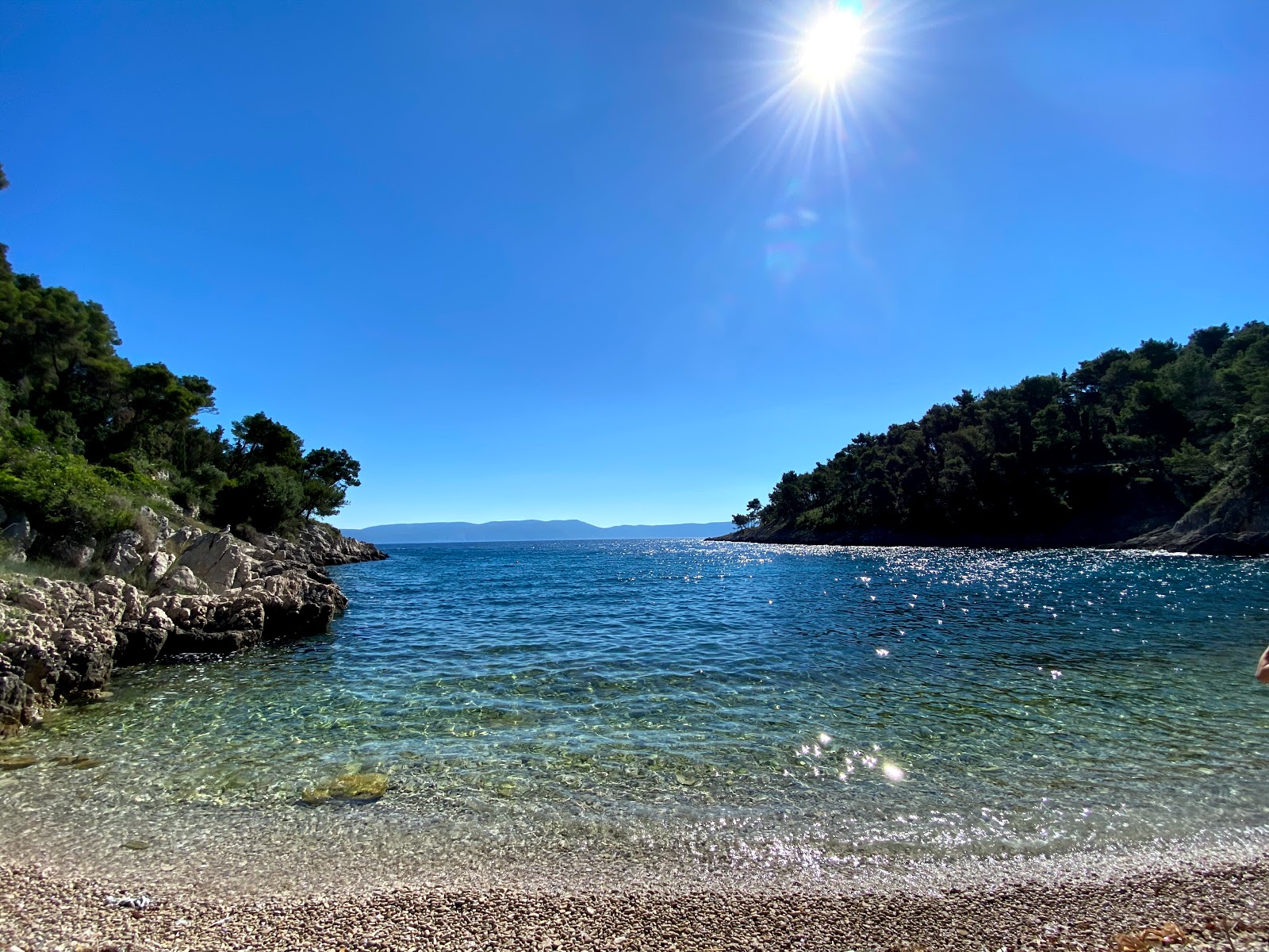 Photo de Drenje beach avec l'eau cristalline de surface