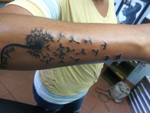 Explore four leaf clover tattoo ideas, creative tattoo ideas in Brick, available at Vision Tattoo