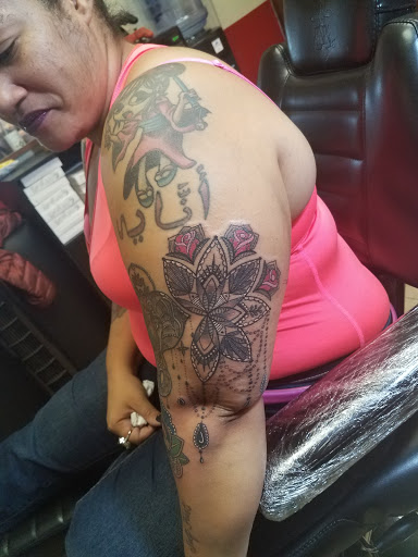 Tattoo Shop «Tattoo Mayhem», reviews and photos, 1510-A Castle Hill Ave, Bronx, NY 10462, USA