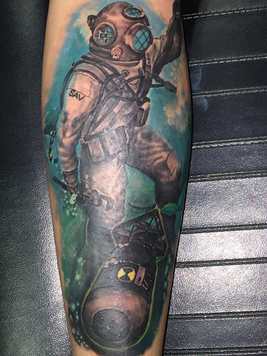 Explore tattoo ideas for hand, creative tattoo ideas in Savannah, available at Tatlyfe Studios