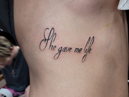 Explore nigerian tattoo ideas, creative tattoo ideas in Angola, available at Hoodlum Ink