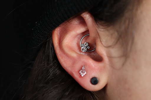 Explore tattoo ideas with flowers and names, creative tattoo ideas in West Palm Beach, available at Wooden Heart Tattoos and Piercings