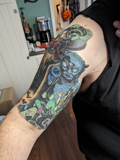 Explore cancer tattoo ideas for females, creative tattoo ideas in Erie, available at Code of Honor Tattoo