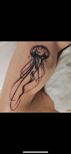 Explore spine tattoo ideas male, creative tattoo ideas in Sarasota, available at SEVEN SINS Tattoo Studio