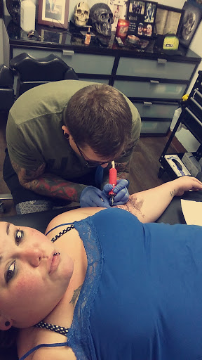 Explore rosary tattoo ideas, creative tattoo ideas in Springfield, available at Anchored Ink Tattoo & Piercing by SPLAT LLC