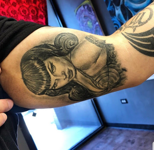Explore mike tyson tattoo ideas, creative tattoo ideas in Odessa, available at Black Cat Tattoo Company