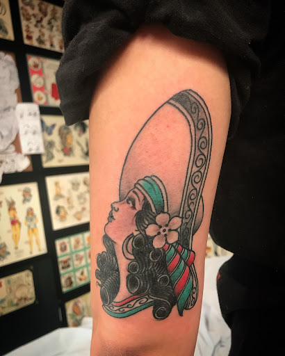 Explore lower back tattoo ideas for men, creative tattoo ideas in Libertyville, available at Lucky Seven Tattoo