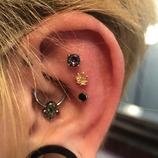 Explore love tattoos ideas, creative tattoo ideas in Palm Harbor, available at Angry Owl Tattoo and Piercing