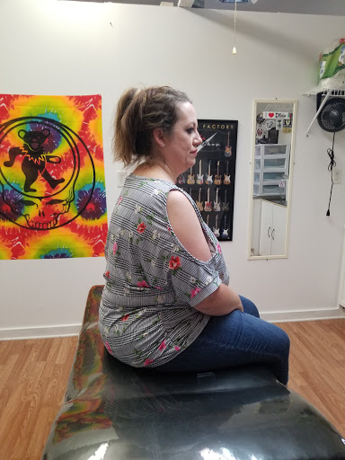 Explore adoption tattoos ideas, creative tattoo ideas in Anniston, available at Artistic Addictions