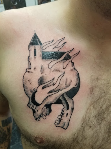 Explore predator tattoo ideas, creative tattoo ideas in Rogers, available at Saved by Grace Tattoo Studio