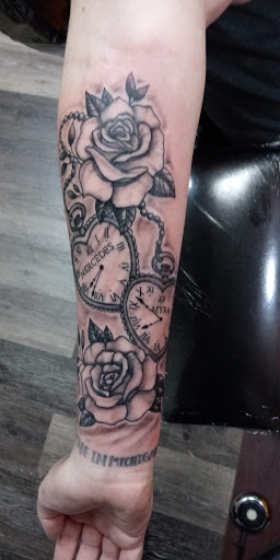 Explore back hand tattoo ideas, creative tattoo ideas in Stanton, available at Tattoos By Wojo