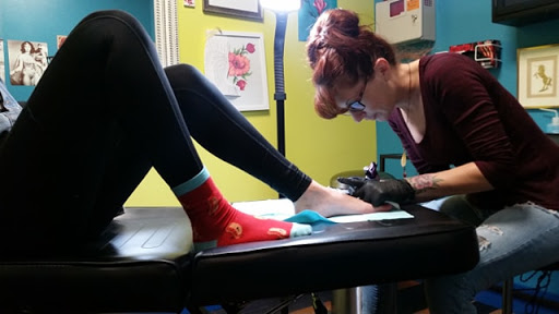 Explore women's leg tattoo ideas, creative tattoo ideas in Whitmore Lake, available at Lovely Monkey Tattoo