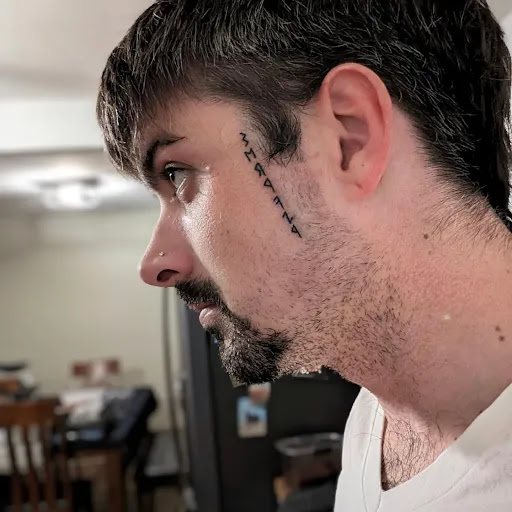 Explore bicep tattoo ideas for guys, creative tattoo ideas in Williamstown, available at DNA Tattooing Llc