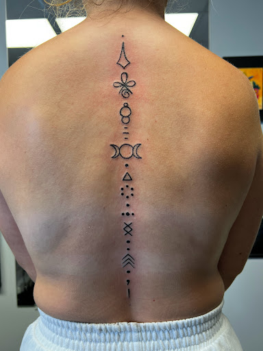 Explore cross tattoo ideas for females, creative tattoo ideas in Greenfield, available at Tattoos In Time Studio