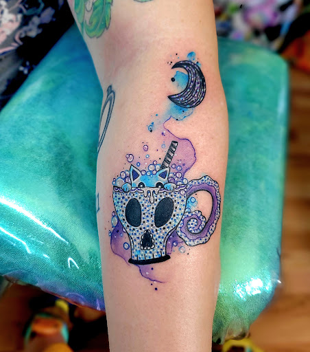 Explore red tattoo ideas, creative tattoo ideas in Benton, available at Spectrum Tattoo