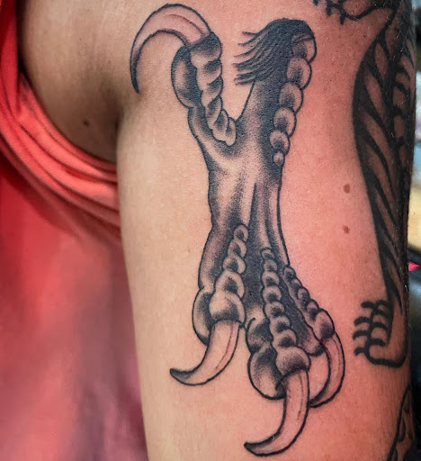 Explore earlobe tattoo ideas, creative tattoo ideas in Miami Beach, available at Tattoos by Lou Miami - South Beach