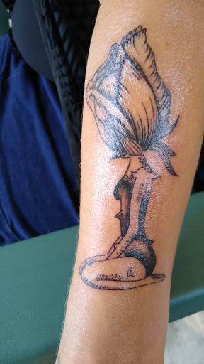 Find jewel tattoo ideas for your next unique tattoo in Cedar Creek at Inkd Out Tattoos