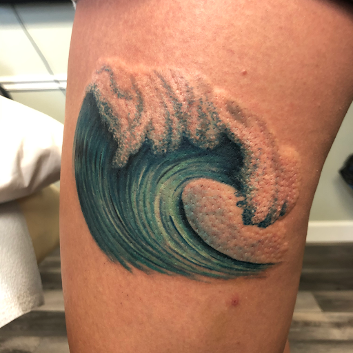 Explore jawline tattoo ideas, creative tattoo ideas in Englewood, available at Point of Entry Tattoo