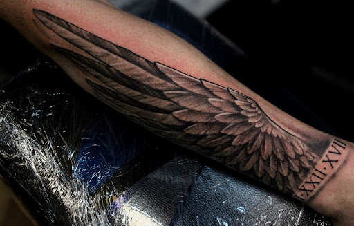 Explore family tree tattoo ideas, creative tattoo ideas in Homosassa, available at Citrus Tattoos