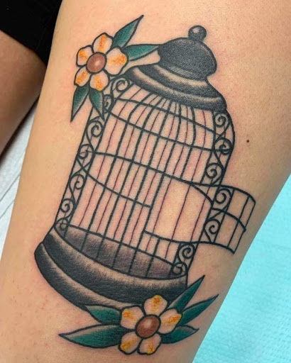 Explore tattoos on the thigh ideas, creative tattoo ideas in Powell, available at Against All Odds Tattoos and Piercings