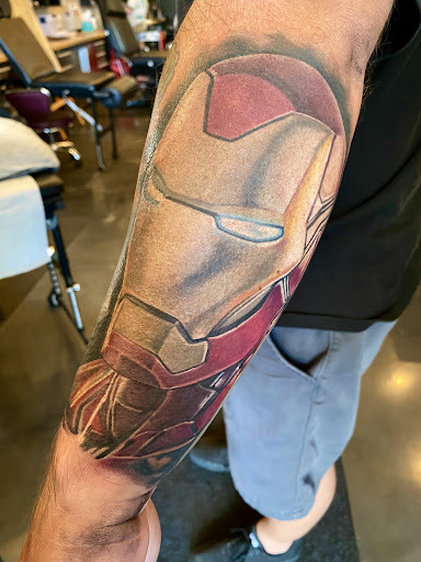 Explore cover up tattoo ideas female shoulder, creative tattoo ideas in Orange Park, available at Revelation Tattoo company