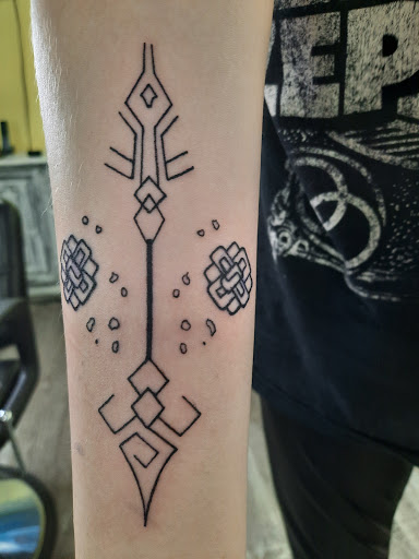 Explore number 4 tattoo ideas, creative tattoo ideas in Bakersfield, available at Society 9 Tattoo and Body Art Studio