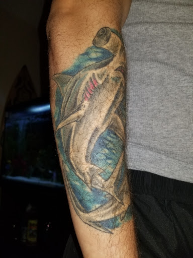 Explore cosmic tattoo ideas, creative tattoo ideas in Orange Beach, available at Orange Beach Tattoos