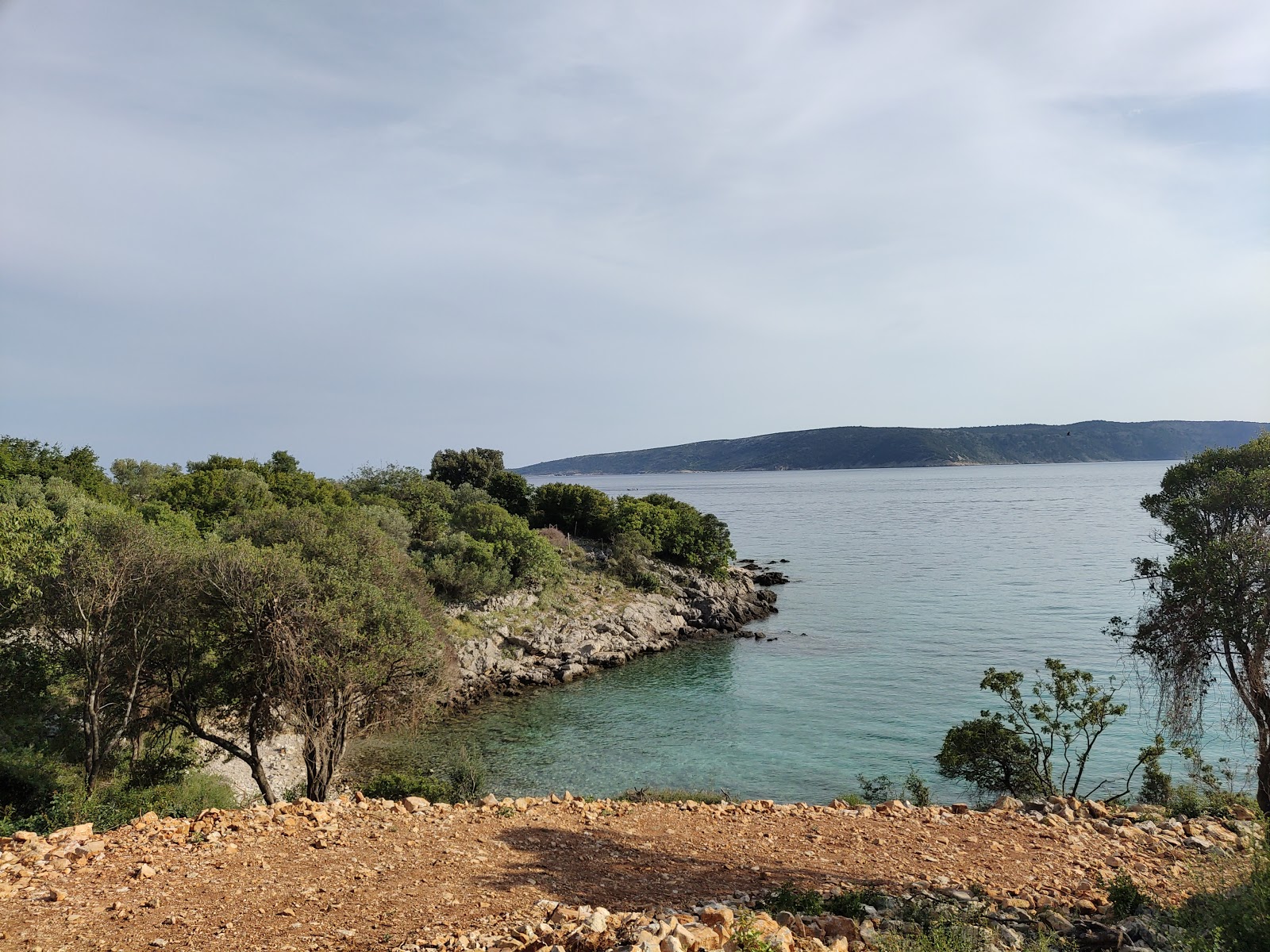 Zdjęcie St. George wild beach z powierzchnią turkusowa czysta woda