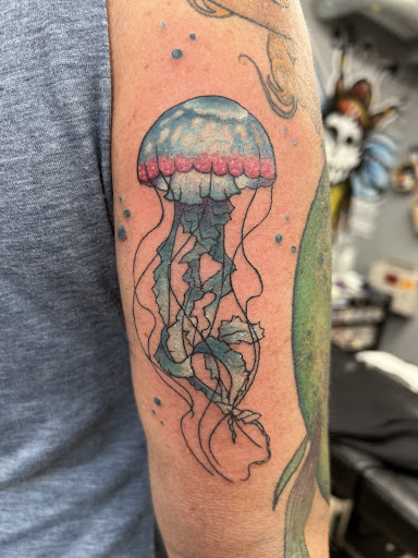 Explore good hand tattoo ideas, creative tattoo ideas in Towson, available at Layer 3 Collective