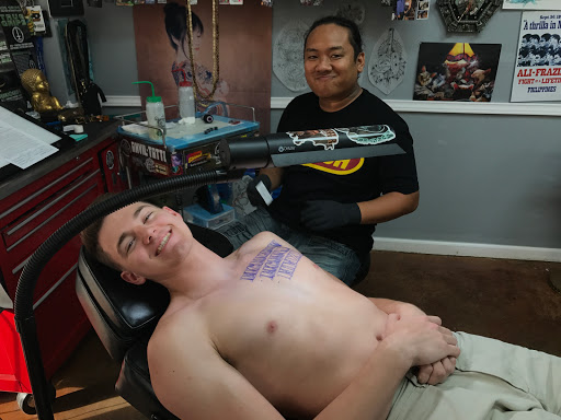 Explore cheshire cat tattoo ideas, creative tattoo ideas in Arlington, available at Urbans Tattoo & Piercing Studio