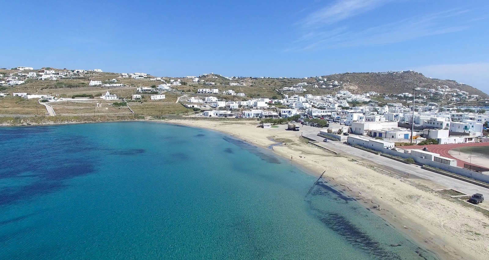 Foto von Paralia Korfos mit heller sand Oberfläche