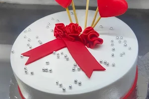 The cake corner and balloon decoration image