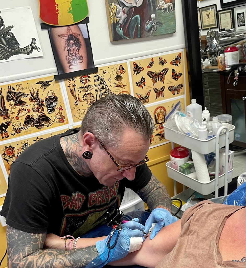 Tap’s Electric Iron Tattoo & Piercing 81082
